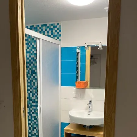 Laguna Blu Sole Con Terrazza Panoramica In Comune בית הארחה