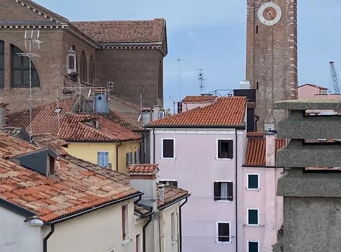 Гостевой дом Laguna Blu Sole Con Terrazza Panoramica In Comune Кьоджа